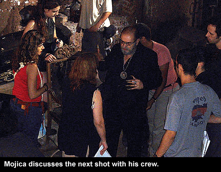 Mojica discusses a shot with his crew.